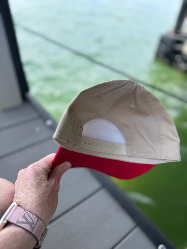 Back closure of Stars, Stripes & Synapses tan and red ball cap