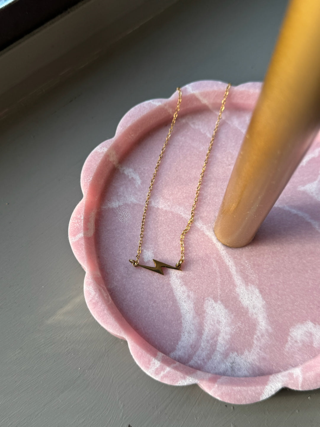 Ladyspinedoc Gold Lightning Bolt Necklace in round pink tray