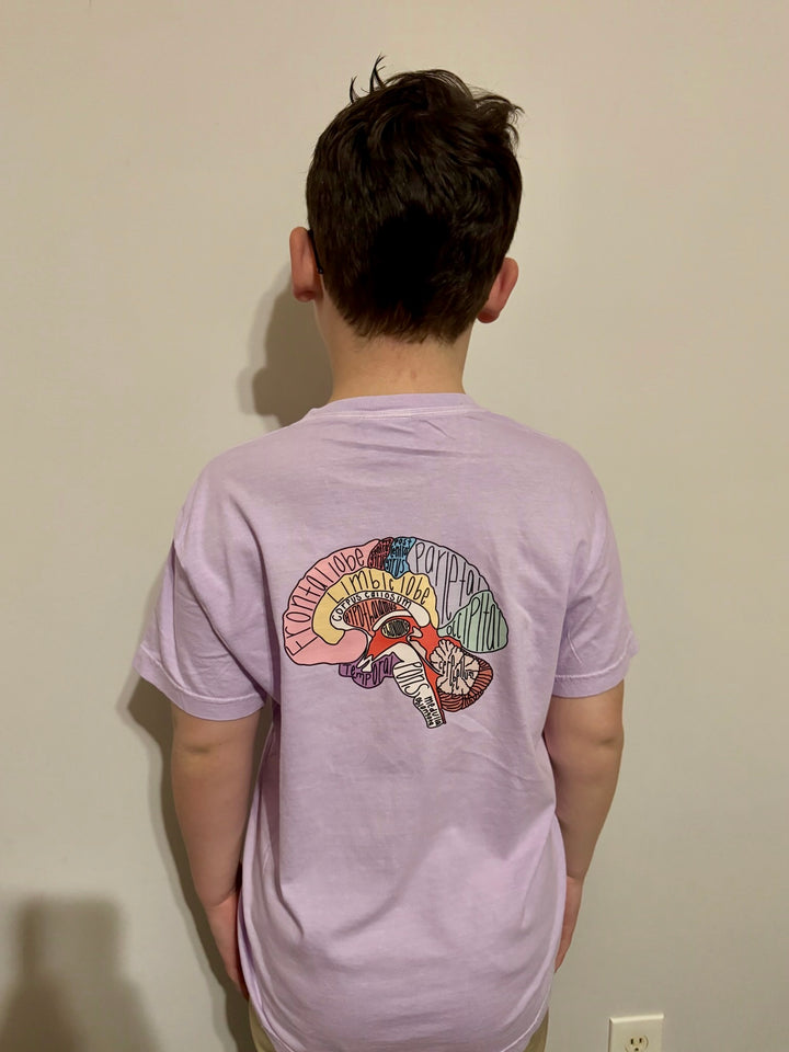 Youth showing off the back of the purple "I Lobe You" Brain Anatomy Tee with labeled parts of the brain