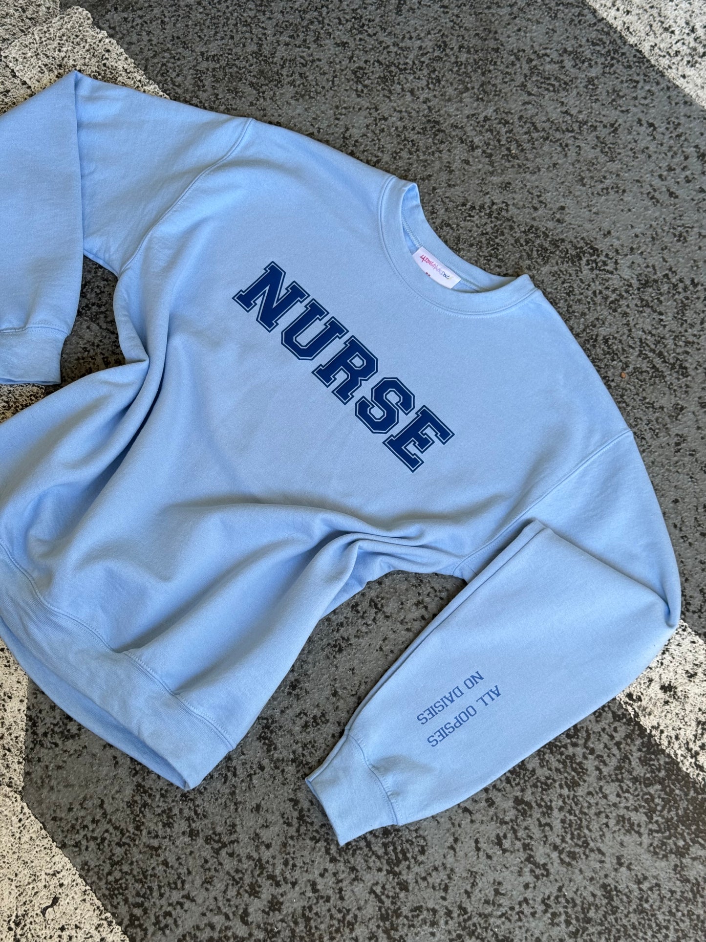 Scrubhacks Collab: All Oopsies No Daisies Nurse Sweatshirt