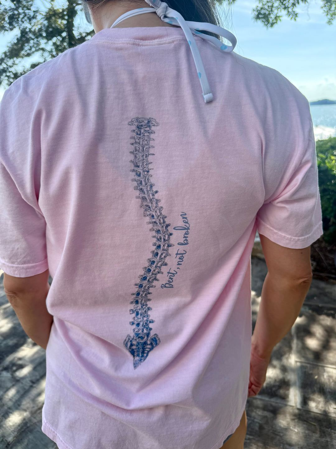 Back design detail of the Bent, Not Broken Scoliosis Awareness Tee - Pink Cotton T-Shirt Short Sleeve