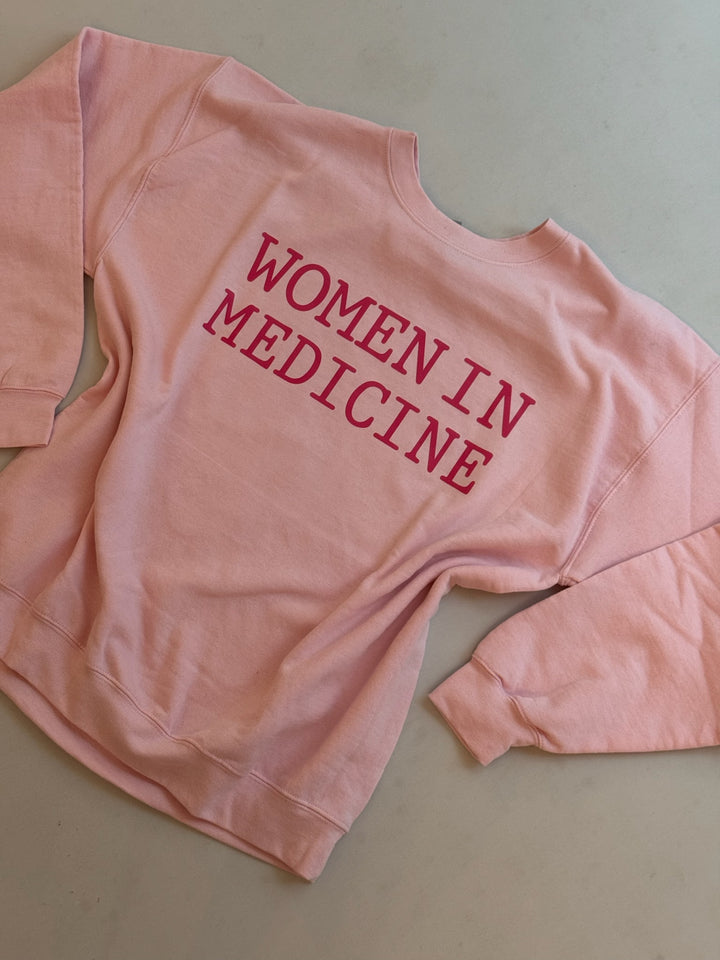 Sweatshirt folded to highlight the front design and soft fabric texture.