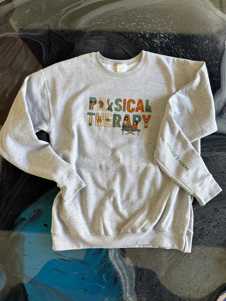 Heather gray sweatshirt with 'Physical Therapy' text on front and 'Movement is Medicine" on the left sleeve.