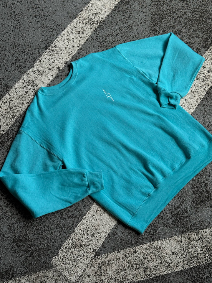 Front of Big Brain Energy Sweatshirt showing the signature Ladyspinedoc lightning bolt