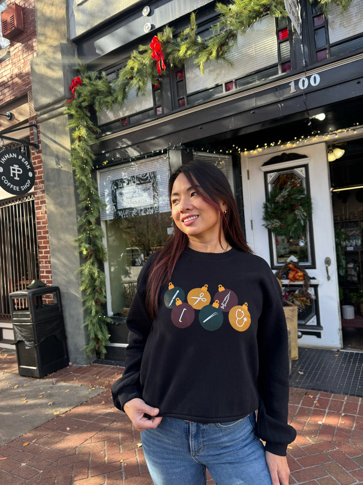 The Confidence Doc Collab: Cropped Surgical OR_naments Christmas Sweatshirt