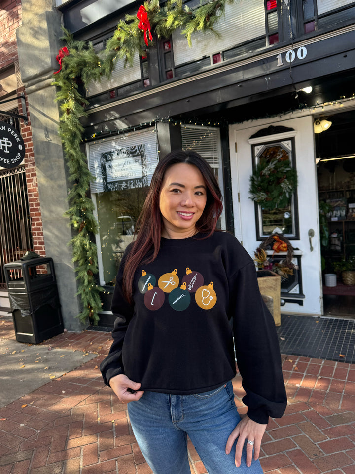 The Confidence Doc Collab: Cropped Surgical OR_naments Christmas Sweatshirt