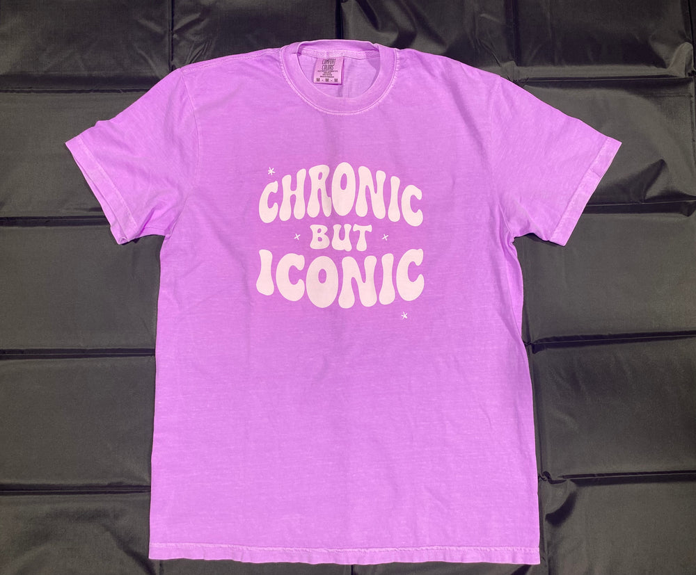 Purple t-shirt with 'Chronic But Iconic' text on a black background