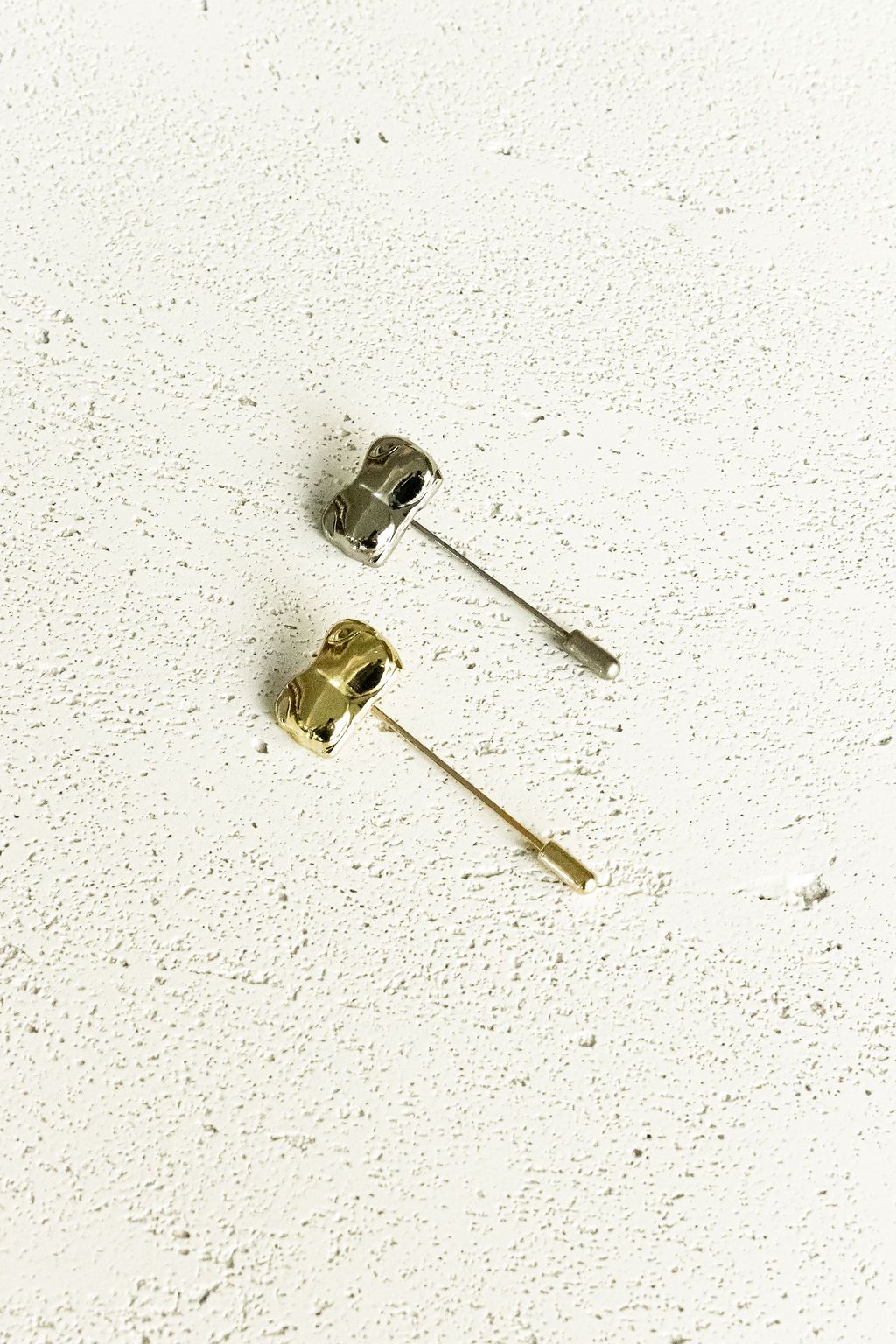  Bust / Breast / Bosom Stick Pins shown in silver and gold on white background