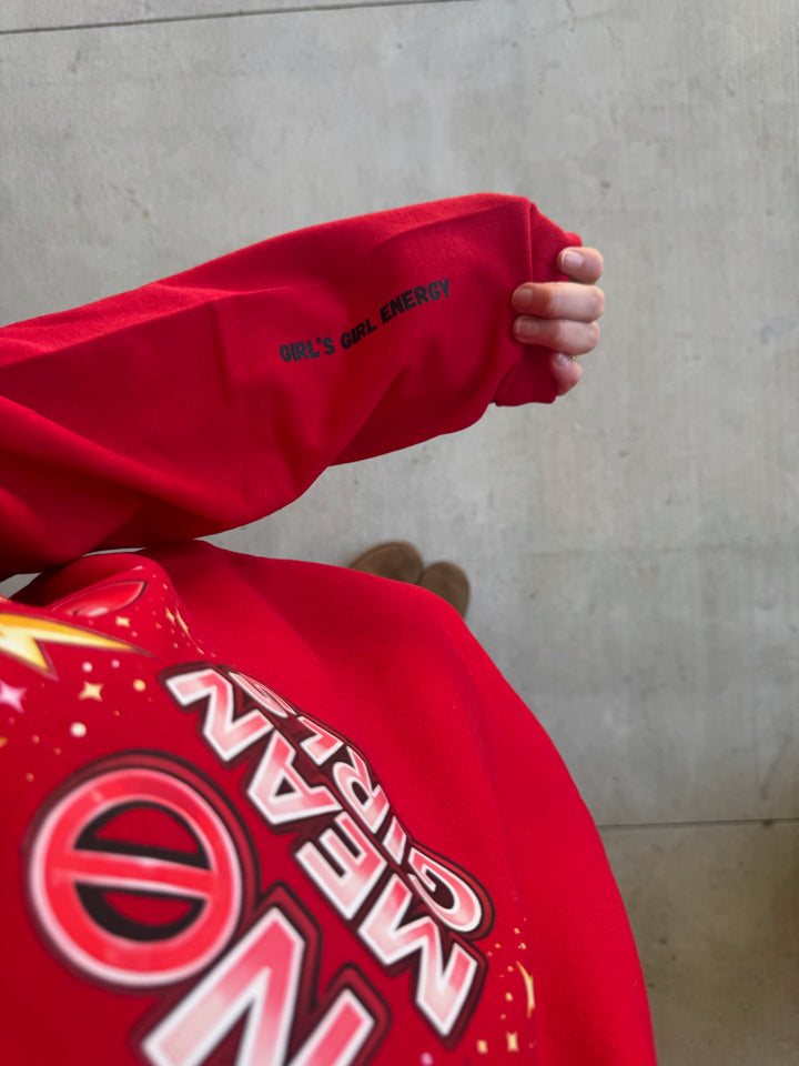 Red No Mean Girls sweatshirt with Girl's Girl Energy sleeve text held up against a neutral background