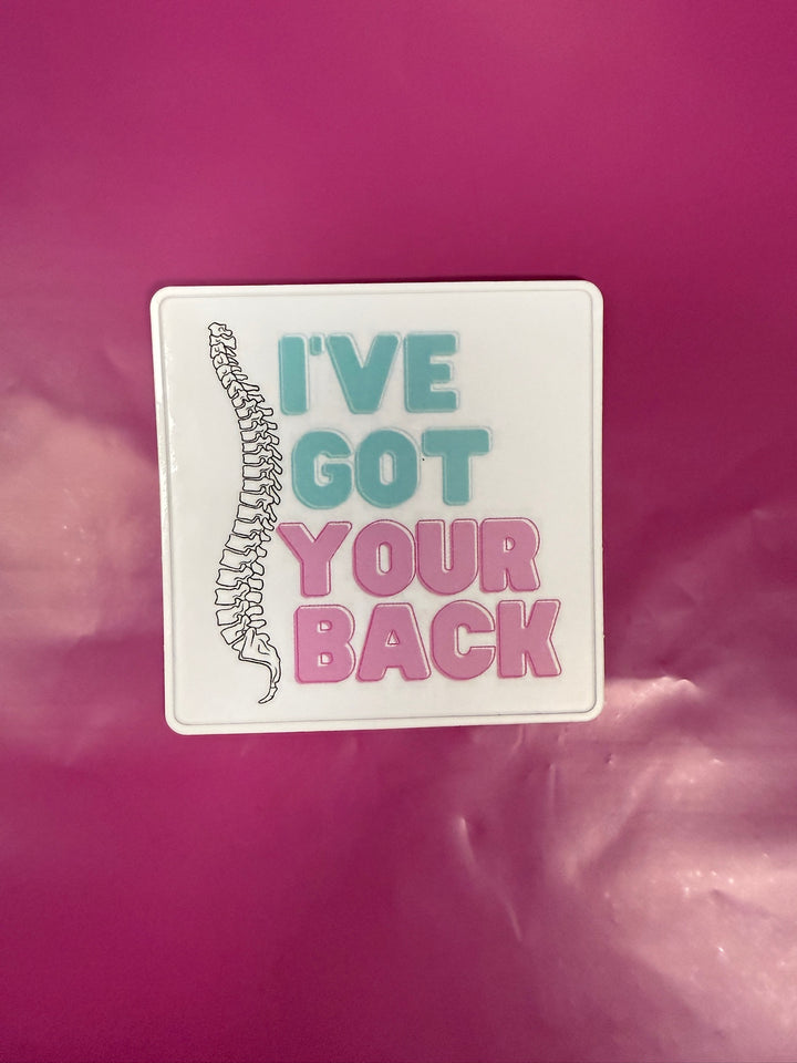 Sticker with spine illustration and text 'I've Got Your Back' on a pink background