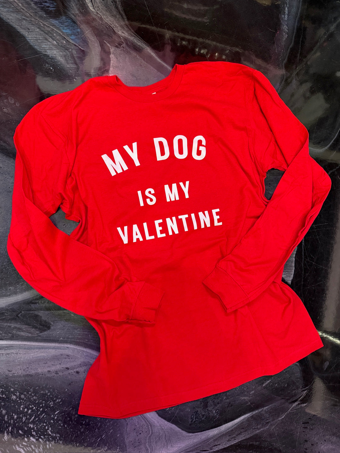 Flat lay of 'My Dog Is My Valentine' Long Sleeve Red Tee Shirt