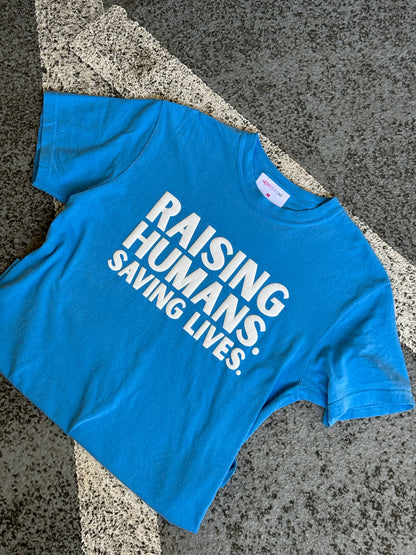 RAISING HUMANS. SAVING LIVES. Mama Tee Shirt - Pink or Blue