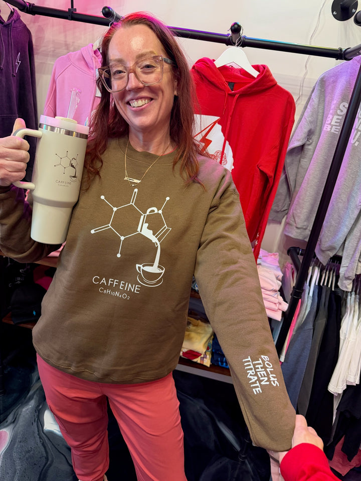 Ladyspinedoc wearing Enerjava Crewneck Sweatshirt - Brown Shirt with Caffeine Molecule Design and Bolus Then Titrate on sleeve
