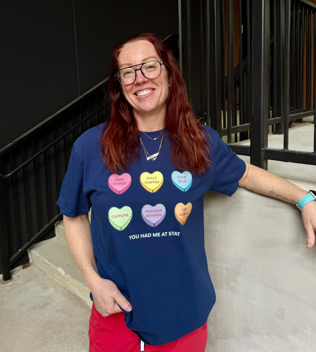 Ladyspinedoc wearing Navy Nurse Tee with Candy Hearts design and You Had Me At Stat text.