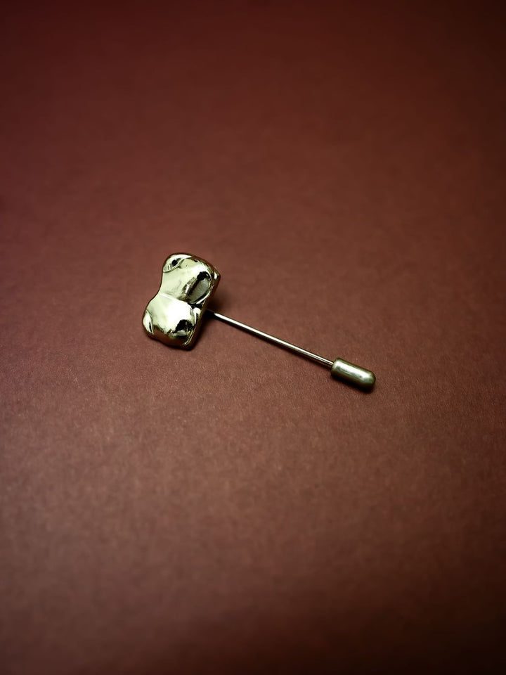 Silver Bust / Breast / Bosom Stick Pin on burgundy background