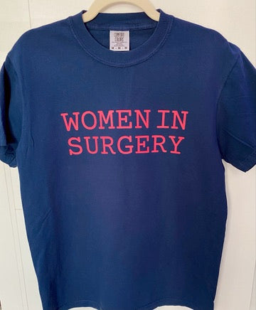 Blue t-shirt with 'WOMEN IN SURGERY' text in pink on a white background