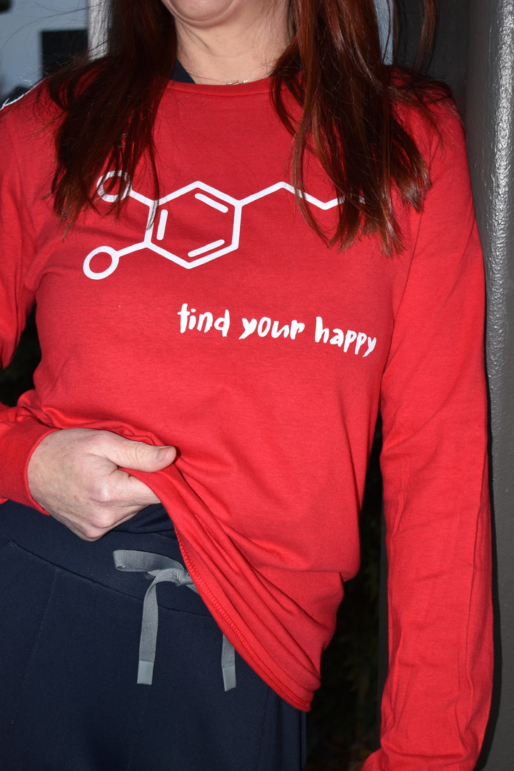 Shirt with White dopamine molecule design on soft red fabric, with the phrase “find your happy” in lowercase letters underneath.