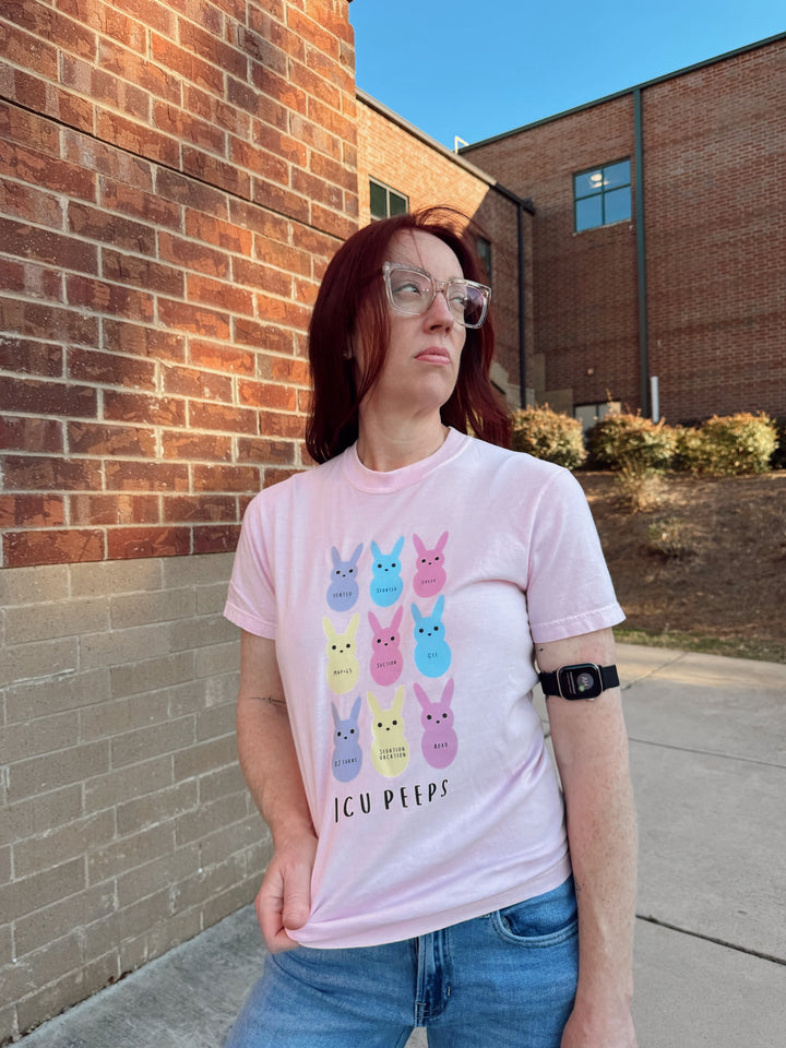 Ladyspinedoc wearing the ICU Squad Tee – Pink Short Sleeve with Pastel Bunnies and ICU Lingo