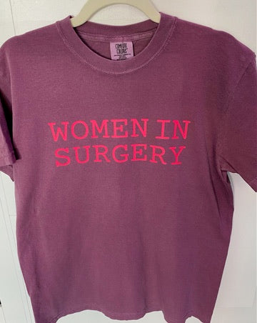 Burgundy t-shirt with 'WOMEN IN SURGERY' text in pink on a white background