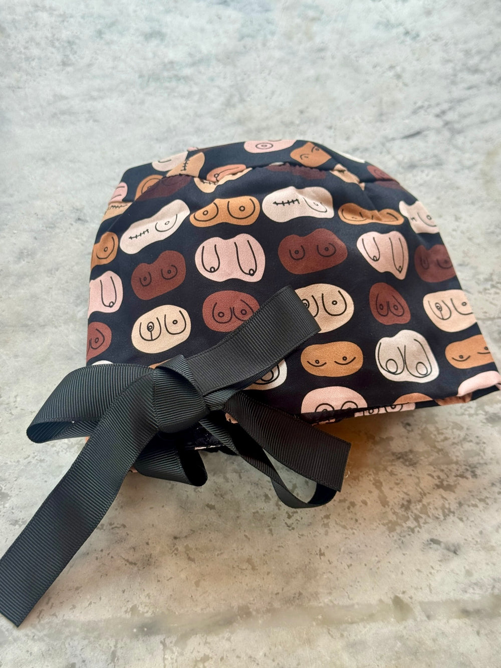 Ponty tail version of the The Bosom Cap - Scrub Hat with Breast Design