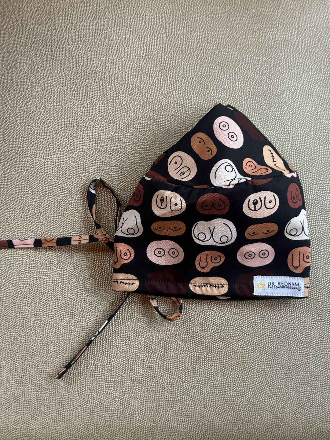 Tie back version of the The Bosom Cap - Scrub Hat with Breast Design