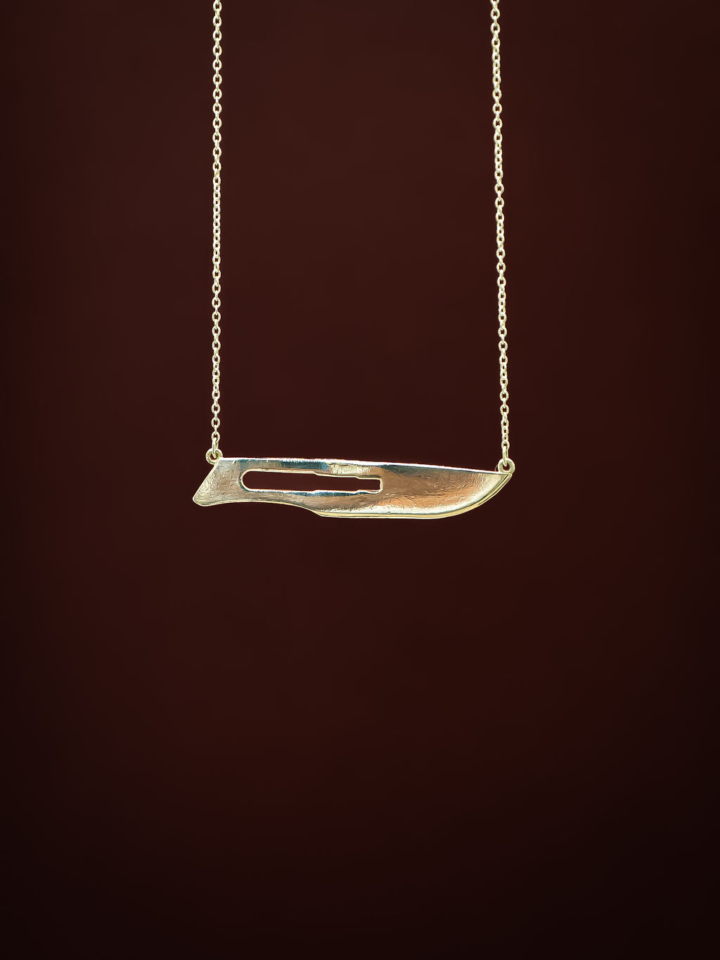 Close up of sterling silver 10 Blade Scalpel Pendant Necklace