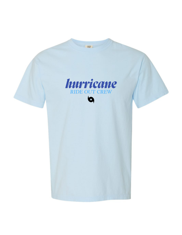 Light blue t-shirt with 'hurricane RIDE OUT CREW' text on a white background