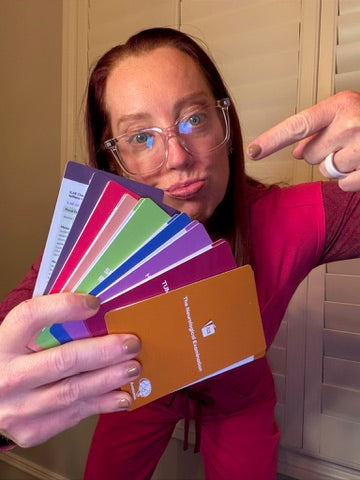 Ladyspinedoc holding scrub cards