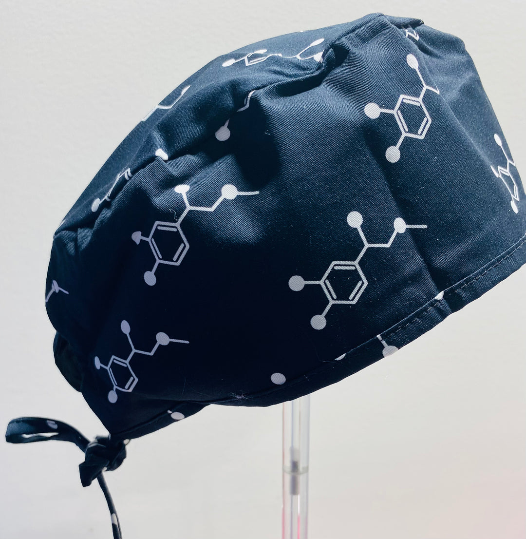 Code Cart Cap - Black Scrub Hat with White Adrenaline Design on a stand
