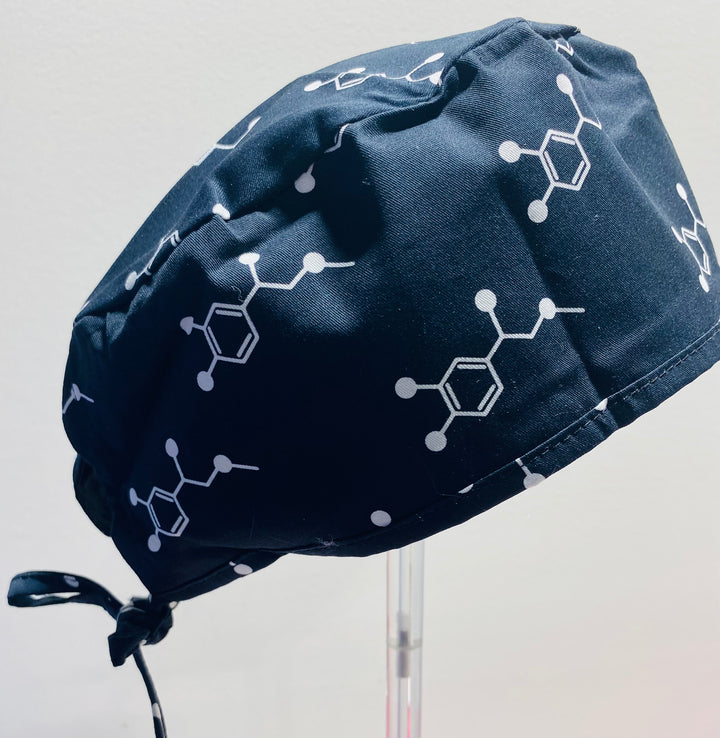 Code Cart Cap - Black Scrub Hat with White Adrenaline Design on a stand