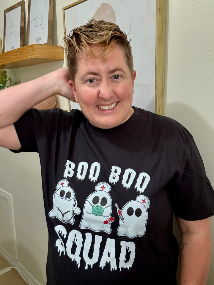 Dr. Beachgem wearing the black Boo Boo Squad Tee Shirt with ghost nurses 
