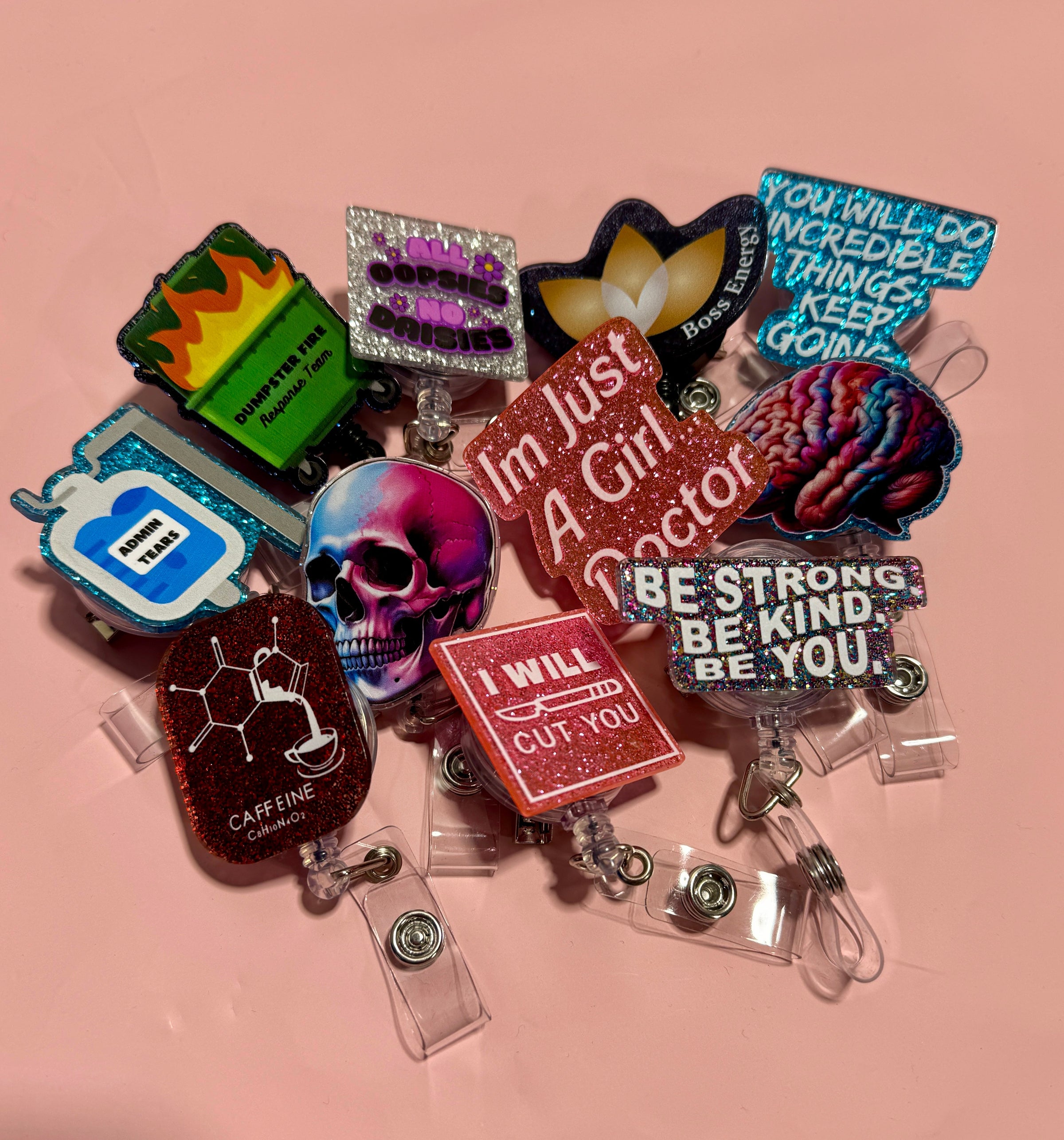 assortment of Ladyspinedoc badge reels