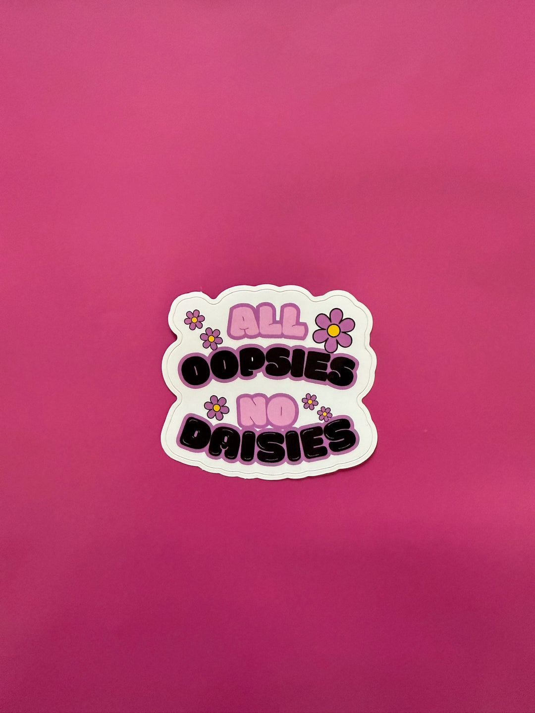 Nurse sticker with 'All Oopsies No Daisies' text on a pink background