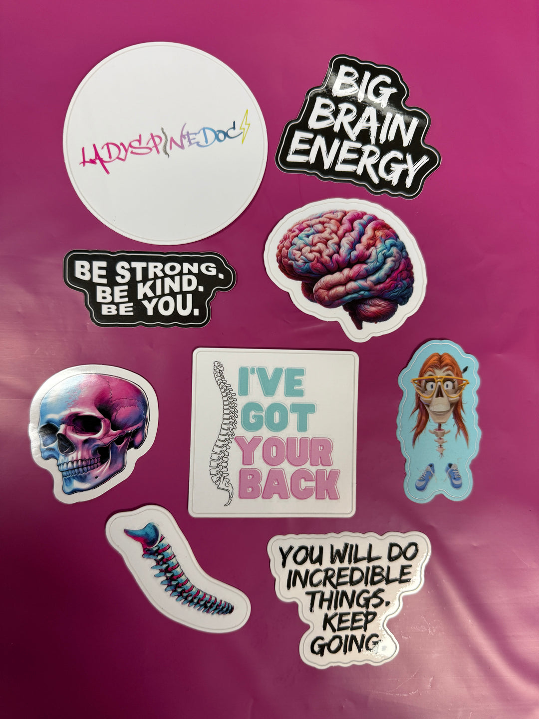 Collection of Ladyspinedoc motivational and decorative stickers on a purple background