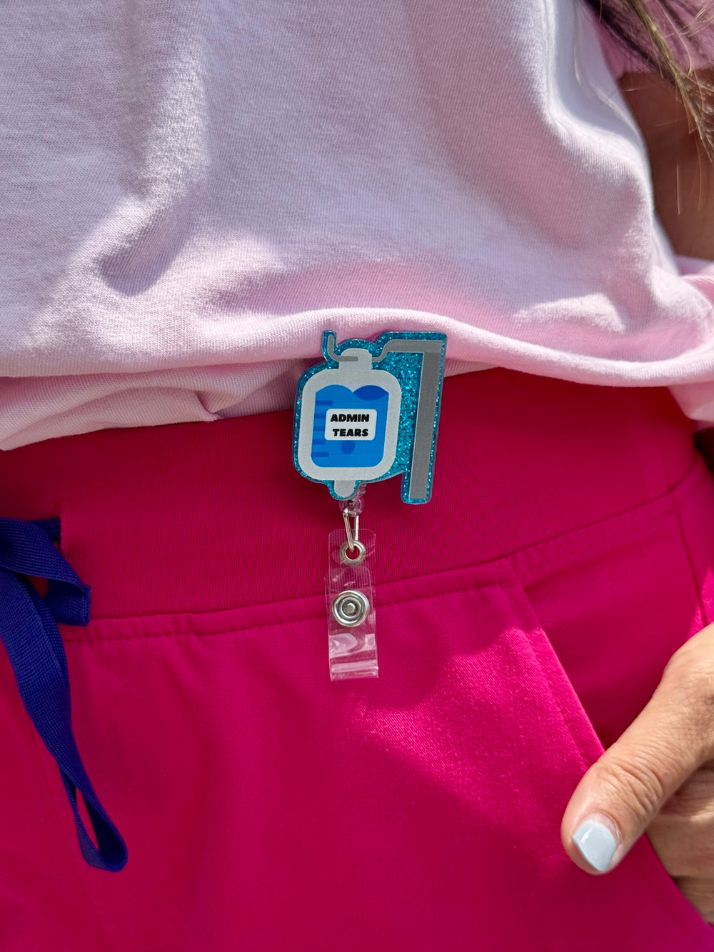Ladyspinedoc x Scrubhacks Admin Tears IV Bag Badge Reel - Retractable with Alligator Clip, clipped on scrub pants