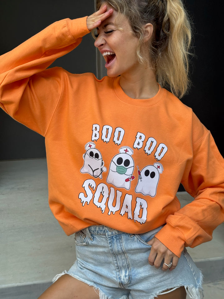 Model wearing the Ladyspinedoc x Dr. Beachgem Collab: Boo Boo Squad Crewneck Sweatshirt – Halloween Shirt for Healthcare Heroes