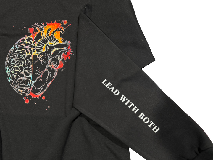Black long-sleeve shirt with a colorful brain and heart design and text on a white background